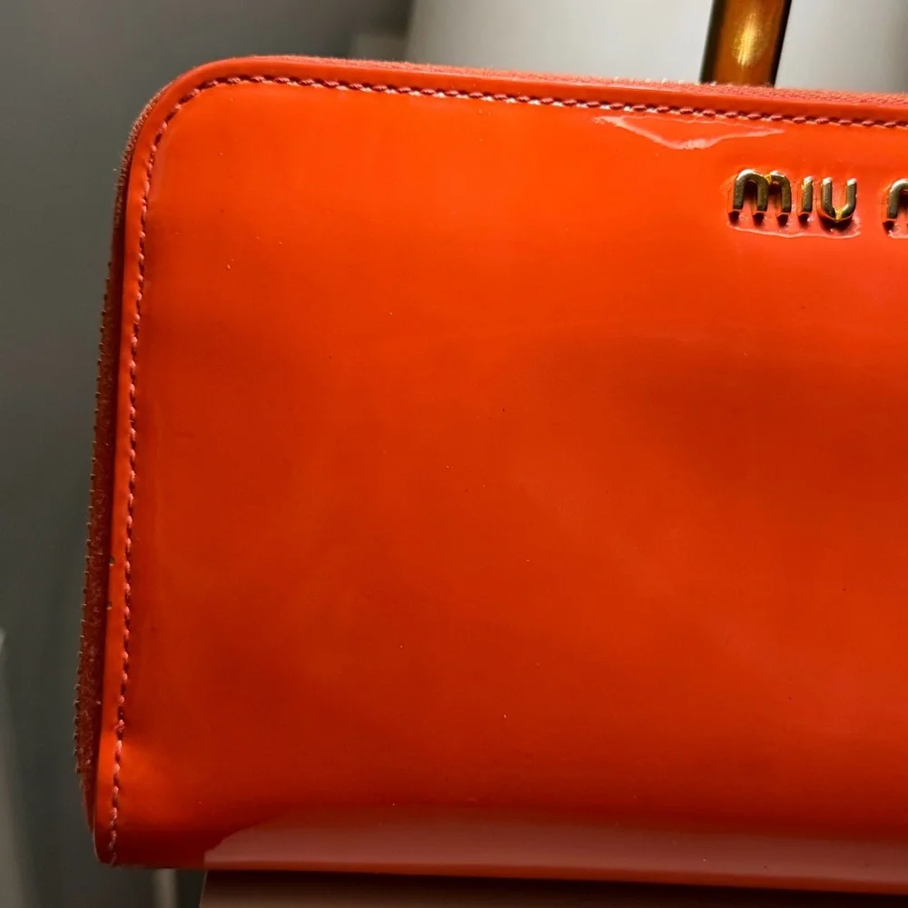 Miu Miu Bright Orange Leather Clutch
